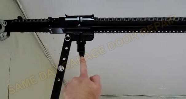 Emergency release cord attachment location on garage door opener track system in Walnut Creek, CA